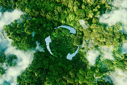 Abstract icon representing the ecological call to recycle and reuse in the form of a pond with a recycling symbol in the middle of a beautiful untouched jungle.