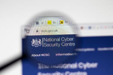 An image of a magnifying glass examining the NCSC website
